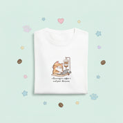 White t-shirt with a cat graphic and text on a white background