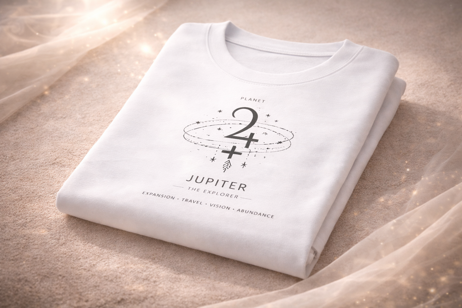 Folded white t-shirt with Jupiter design and text on a textured beige surface