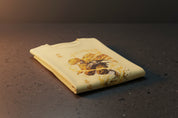 Yellow t-shirt with a graphic design on a white background